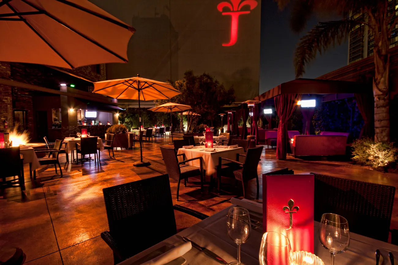 Patio with the red J projected on the wall
